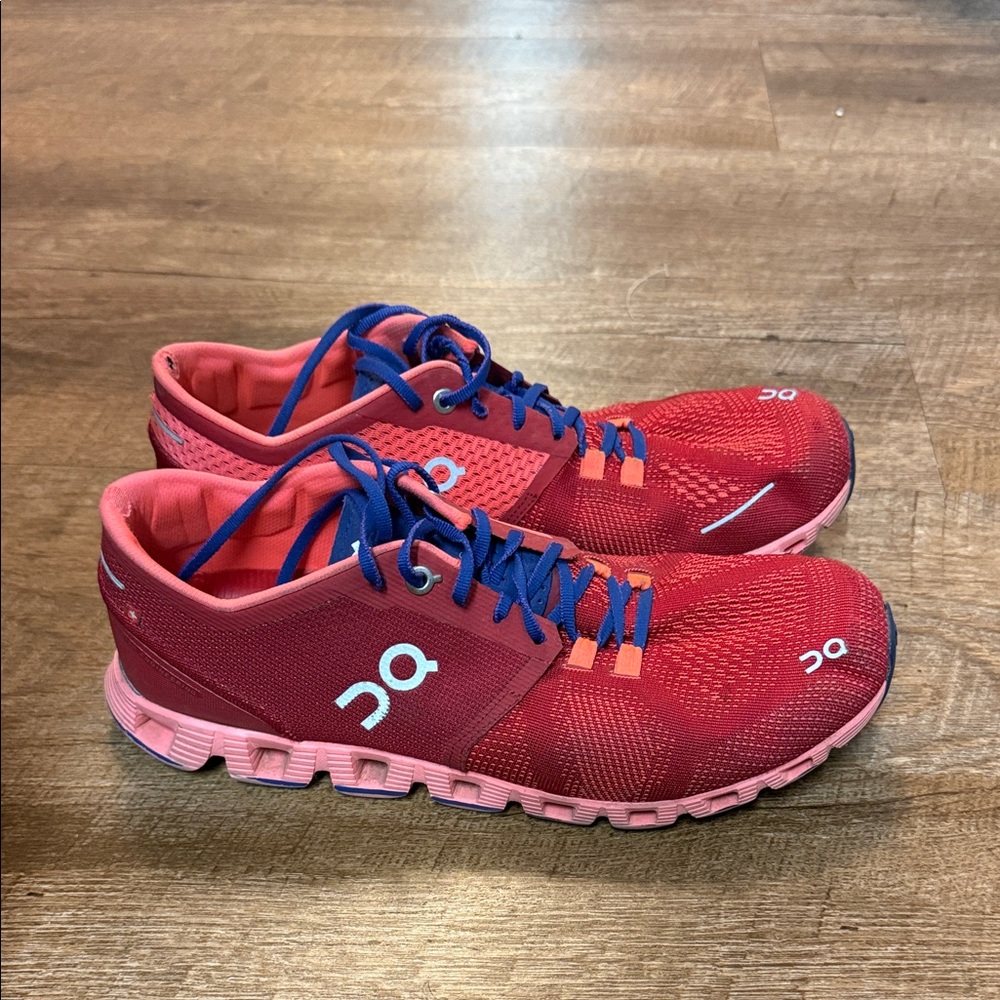 On Running Pink and Blue Athletic Shoes